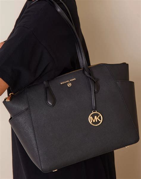 md tz satchel michael kors sylvia|Michael Kors.